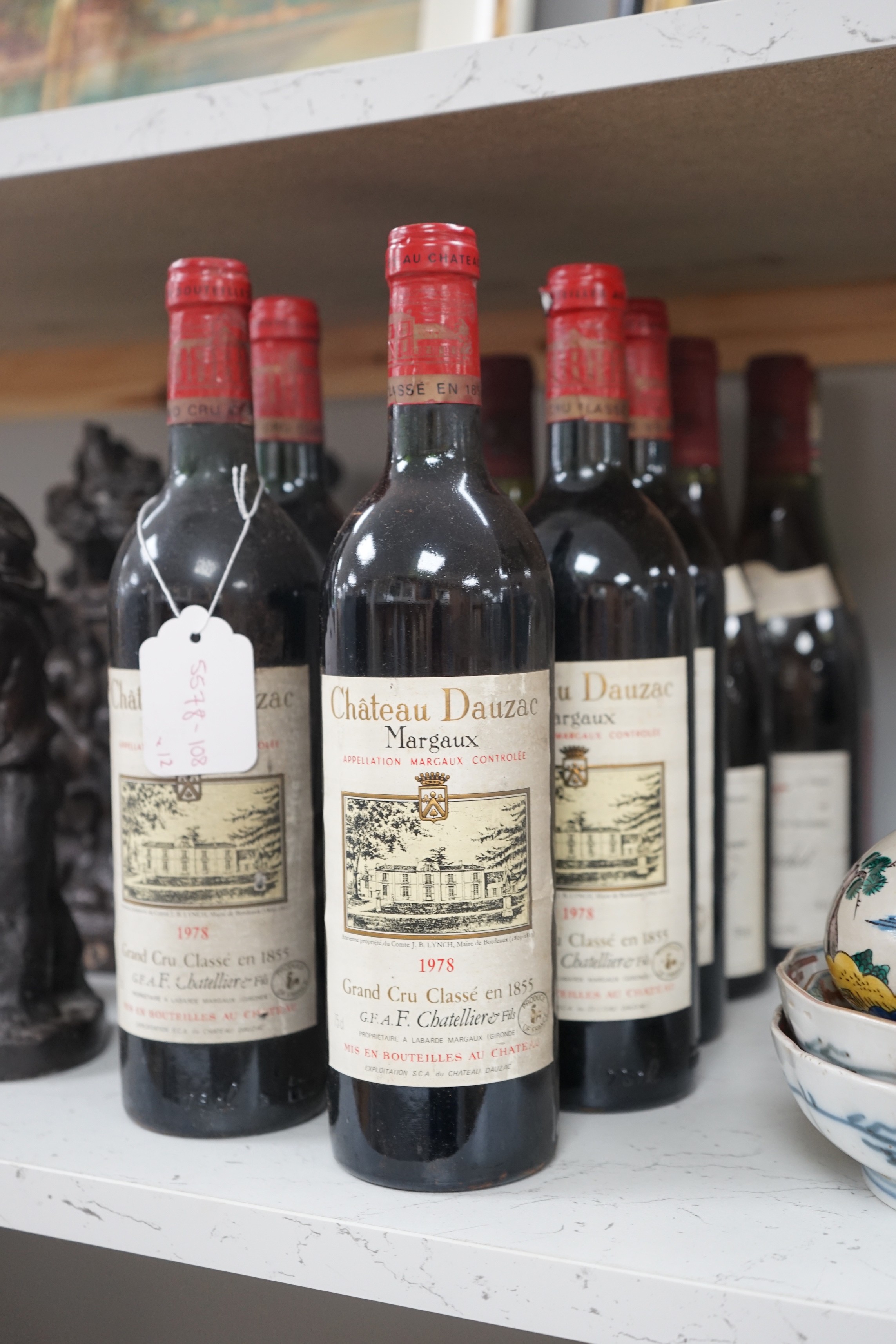 Six bottles of Chateau Dauzac Margaux 1978, four bottles of Chassange-Montrachet 1982 and two other bottles of wine